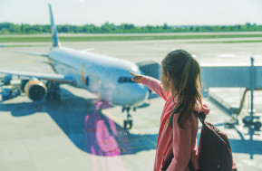 child airport looks plane selective focus kid