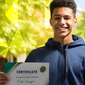 student holding certificate