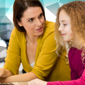 Mother and daughter at laptop